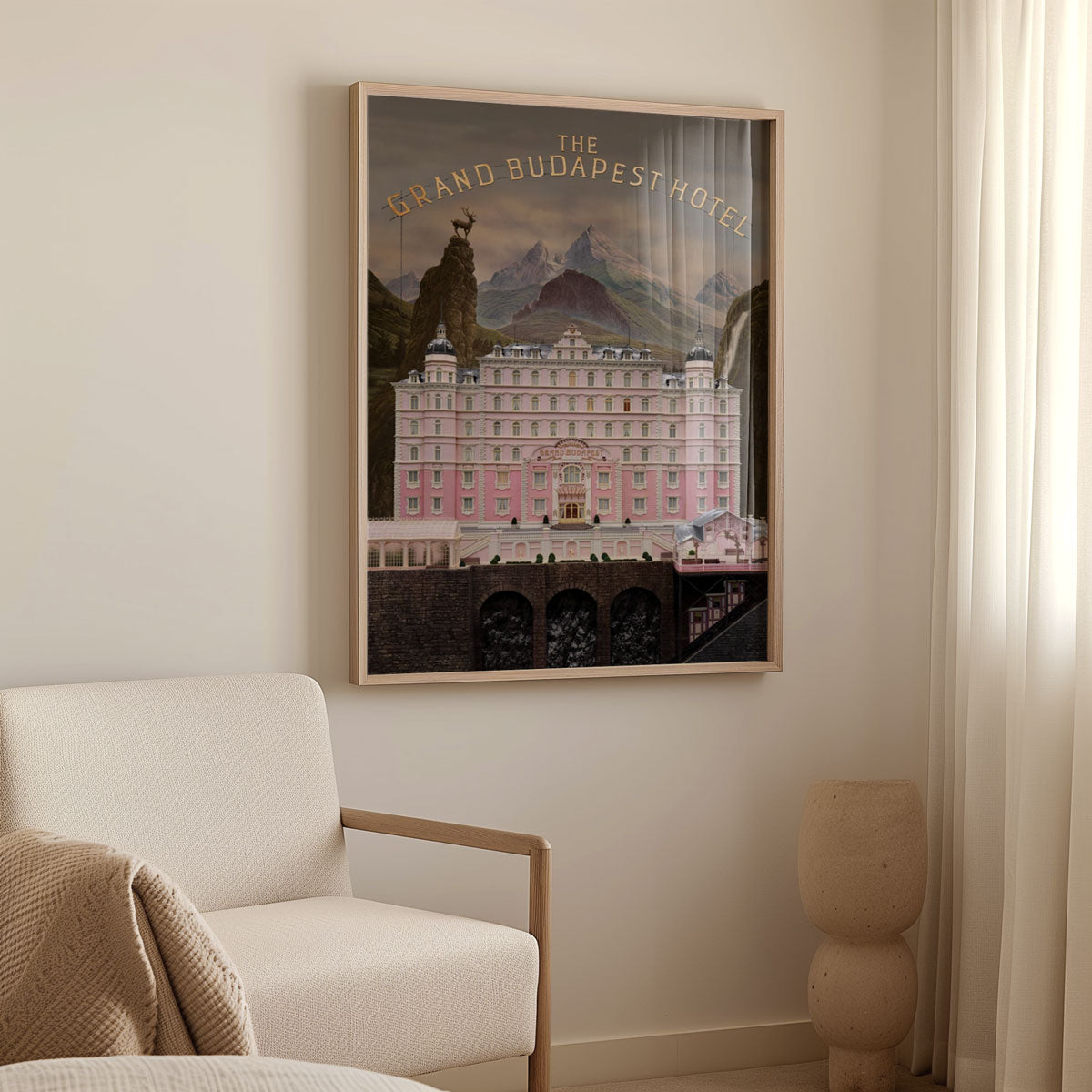 The Grand Budapest Hotel movie poster shown framed on a wall
